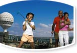 Family mini golfing on a cruise
